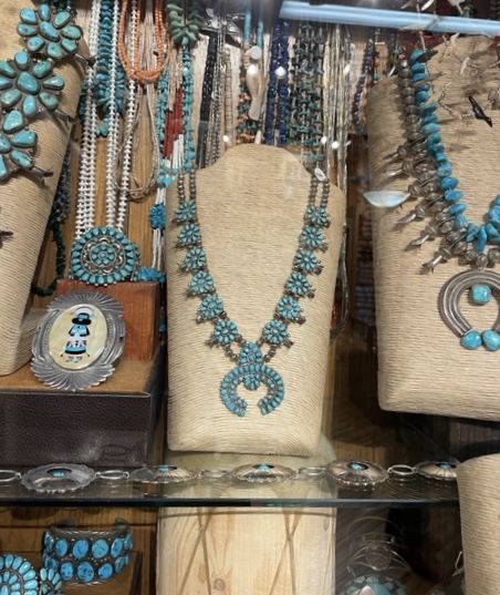 Turquoise jewelry seen when attending writers' conference.